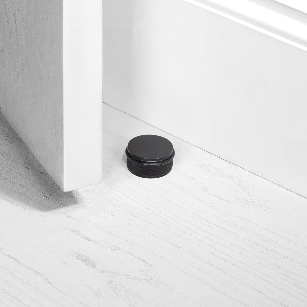 DOOR STOP / FLOOR / CROSS / BLACK